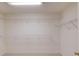 Walk-in closet with shelving at 4975 Duncans Lake Dr, Buford, GA 30519