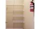 Walk-in closet featuring adjustable shelving at 4975 Duncans Lake Dr, Buford, GA 30519