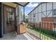 Balcony view of building exterior, showing railing and exterior door at 6851 Roswell Rd # E4, Atlanta, GA 30328