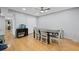 Bright dining room with hardwood floors and neutral paint, adjacent to other living spaces at 6851 Roswell Rd # E4, Atlanta, GA 30328