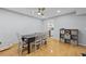 Dining room area with wood floors and direct access to a kitchen area at 6851 Roswell Rd # E4, Atlanta, GA 30328