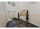Inviting building lobby showcasing unique flooring, staircase, and mailboxes at 6851 Roswell Rd # E4, Atlanta, GA 30328