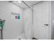 White subway tile shower with rain shower head and a convenient built-in niche for toiletries at 6851 Roswell Rd # E4, Atlanta, GA 30328