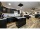 Modern kitchen design with dark cabinets, granite countertops, and island at 1045 Paper Creek Dr, Lawrenceville, GA 30046
