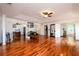 Spacious main bedroom with a ceiling fan, hardwood floors, and lots of natural light at 1045 Paper Creek Dr, Lawrenceville, GA 30046