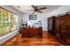 Home office with hardwood floors, lots of natural light, and a ceiling fan at 1045 Paper Creek Dr, Lawrenceville, GA 30046