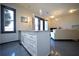 This open kitchen features an island with a sink, stainless steel appliances and seamless access to living area at 1195 Milton Se Ter # 1109, Atlanta, GA 30315
