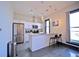 A modern kitchen is equipped with stainless steel appliances, island seating, and granite countertops at 1195 Milton Se Ter # 1109, Atlanta, GA 30315