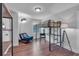 Bedroom featuring wood floors, a bunkbed, a futon sofa and natural light at 135 Old Alabama Rd, Emerson, GA 30137