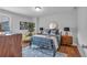 Bright bedroom featuring neutral walls, hardwood floors, modern furniture, and natural light at 135 Old Alabama Rd, Emerson, GA 30137