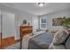 Bedroom featuring light walls, hardwood floors, modern furniture, and natural light at 135 Old Alabama Rd, Emerson, GA 30137