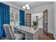 Comfortable office space featuring hardwood floors, bright light, and elegant french doors at 135 Old Alabama Rd, Emerson, GA 30137