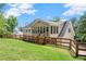 Well-maintained backyard featuring a large lawn with deck at 4223 N Mountain Ne Rd, Marietta, GA 30066