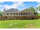 Large green backyard with fence, trees, and lawn at 4223 N Mountain Ne Rd, Marietta, GA 30066