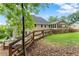 This backyard showcases a large grassy area, perfect for outdoor activities and relaxation at 4223 N Mountain Ne Rd, Marietta, GA 30066