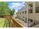 Fenced backyard showcasing a deck, patio and manicured yard at 4223 N Mountain Ne Rd, Marietta, GA 30066