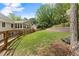 Enjoy the expansive backyard with lush greenery, mature trees, and a great space to play games at 4223 N Mountain Ne Rd, Marietta, GA 30066