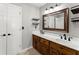 Bathroom features double vanities, wood cabinets, and a framed mirror at 4223 N Mountain Ne Rd, Marietta, GA 30066