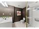 Bathroom features a white vanity, a toilet, and a shower stall with glass door at 4223 N Mountain Ne Rd, Marietta, GA 30066