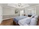Cozy bedroom features hardwood floors, soft lighting, and calming decor for a relaxing retreat at 4223 N Mountain Ne Rd, Marietta, GA 30066