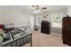 A bedroom features two windows and neutral colored walls at 4223 N Mountain Ne Rd, Marietta, GA 30066