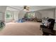 A spacious bonus room with windows and carpeted floor at 4223 N Mountain Ne Rd, Marietta, GA 30066