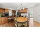 Cozy eat-in area in the kitchen with a wooden table and stainless appliances at 4223 N Mountain Ne Rd, Marietta, GA 30066