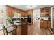 Spacious kitchen with custom wood cabinets, granite countertops, and stainless steel appliances at 4223 N Mountain Ne Rd, Marietta, GA 30066