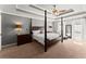 Spacious bedroom features a tray ceiling, ceiling fan, and large windows at 4223 N Mountain Ne Rd, Marietta, GA 30066