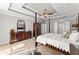 Spacious bedroom features a tray ceiling, ceiling fan, and furniture at 4223 N Mountain Ne Rd, Marietta, GA 30066