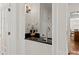 Convenient wet bar area featuring a granite countertop and modern faucet at 4223 N Mountain Ne Rd, Marietta, GA 30066