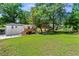Large backyard with green grass, a patio, and plenty of space at 1790 Shirley Sw St, Atlanta, GA 30310