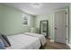 Cozy bedroom with soft light, a closet, and pale green walls at 1790 Shirley Sw St, Atlanta, GA 30310