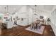 Modern kitchen with white cabinetry, stainless steel appliances, and an adjacent dining area at 1790 Shirley Sw St, Atlanta, GA 30310