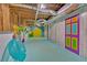 Finished basement with painted floors, decorative door and walls, with a hammock and raft at 185 Waverly Walk, Douglasville, GA 30134