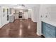 Open kitchen with stainless steel appliances, bright countertops, and seamless transition to the living spaces at 185 Waverly Walk, Douglasville, GA 30134