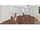 Open-concept living space with hardwood floors, neutral tones, and seamless transition between living areas at 185 Waverly Walk, Douglasville, GA 30134