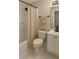 A serene bathroom showcasing a shower with curtain and modern sink at 191 Northdale Pl, Lawrenceville, GA 30046