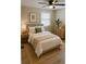 Comfortable bedroom featuring a queen-sized bed, natural lighting, and warm decor at 191 Northdale Pl, Lawrenceville, GA 30046