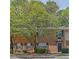 Inviting brick apartment complex featuring lush landscaping and well-maintained grounds, offering a serene living environment at 191 Northdale Pl, Lawrenceville, GA 30046
