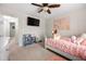 Inviting bedroom with pink accents and a ceiling fan at 758 Beranda Cir, Douglasville, GA 30134