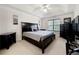 Spacious main bedroom features tray ceiling, neutral colors, and dark furniture at 758 Beranda Cir, Douglasville, GA 30134