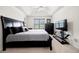 Spacious main bedroom with tray ceiling features a large bed and plenty of furniture at 758 Beranda Cir, Douglasville, GA 30134