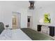 This bedroom boasts modern decor with unique lighting and a view into an adjacent bathroom at 775 Juniper St # 212, Atlanta, GA 30308