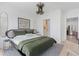 Cozy bedroom featuring a comfortable bed, modern decor, ample natural light, and access to a walk-in closet at 775 Juniper St # 212, Atlanta, GA 30308