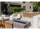 Cozy fire pit area with comfortable seating, perfect for cool evenings at 775 Juniper St # 212, Atlanta, GA 30308