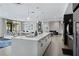 Elegant living room with modern kitchen and fireplace at 775 Juniper St # 212, Atlanta, GA 30308