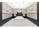 Well-lit mailroom featuring bird-themed wallpaper and plenty of mailboxes for tenants at 775 Juniper St # 212, Atlanta, GA 30308