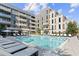 Beautiful pool area with lounge chairs for relaxing on a sunny day at 775 Juniper St # 212, Atlanta, GA 30308
