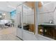 Private work booth featuring a desk, storage, and natural light, perfect for focused work or confidential calls at 775 Juniper St # 212, Atlanta, GA 30308